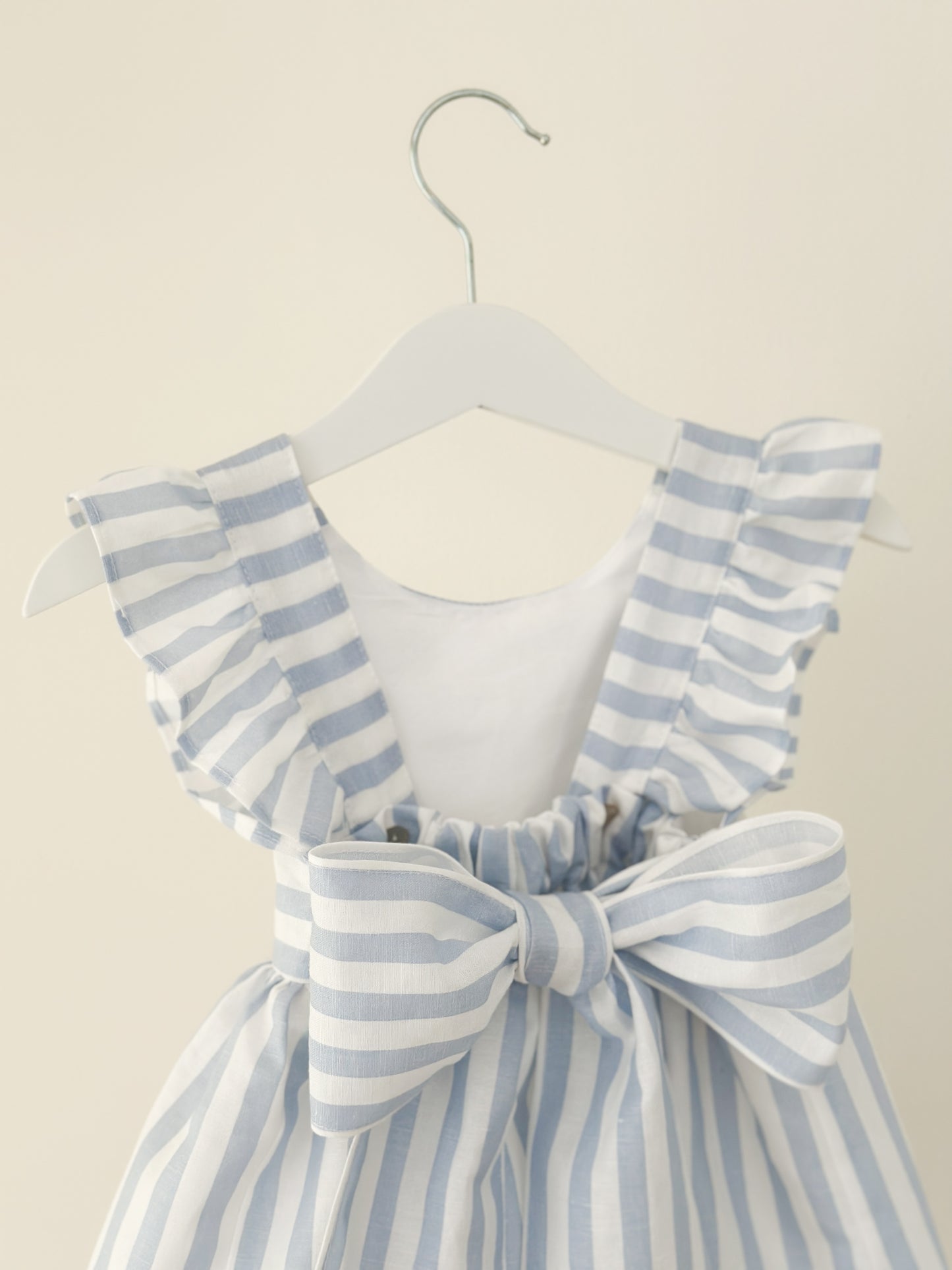 Dulci Bow Dress in striped blue fabric