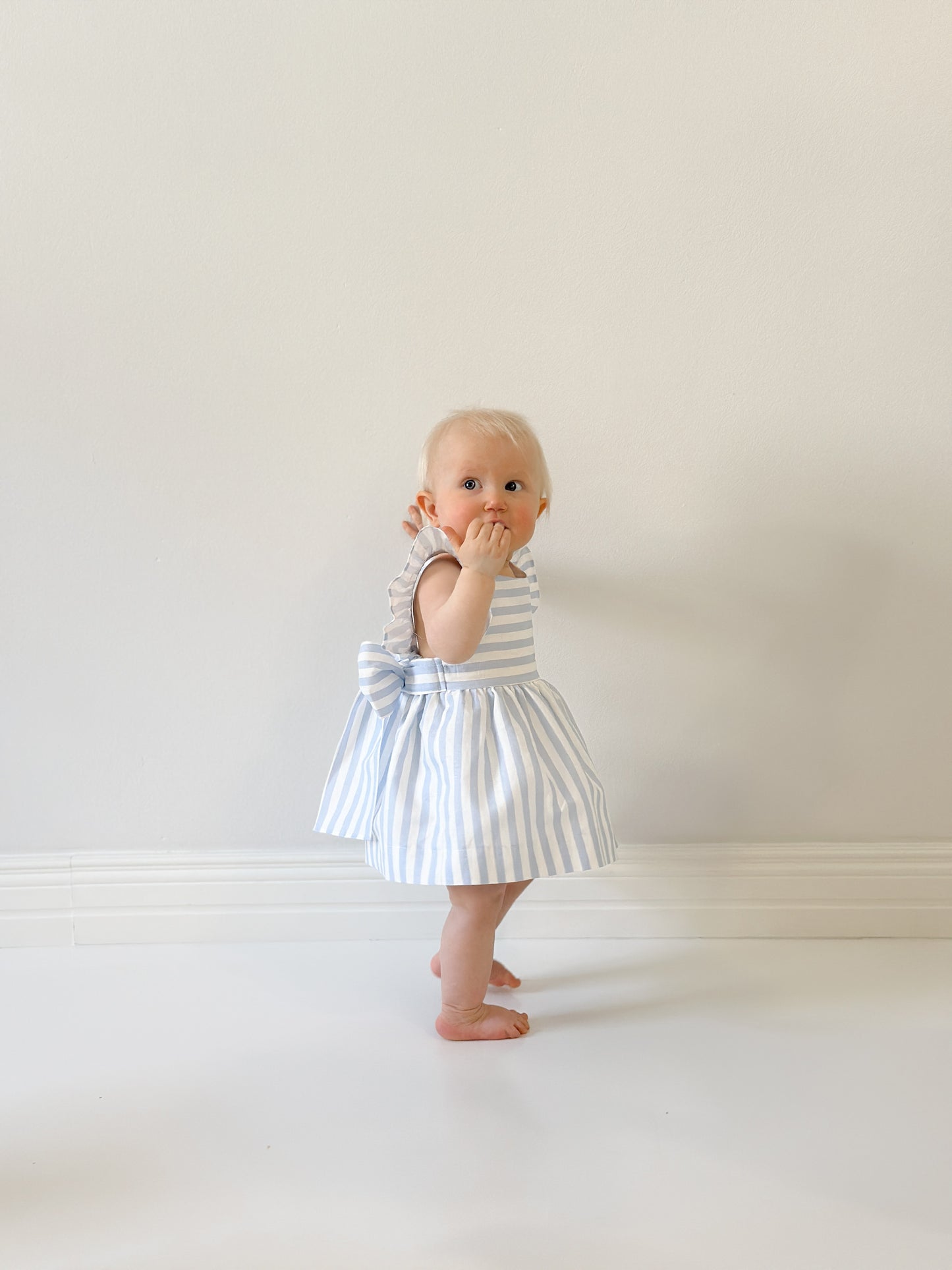 Dulci Bow Dress in striped blue fabric