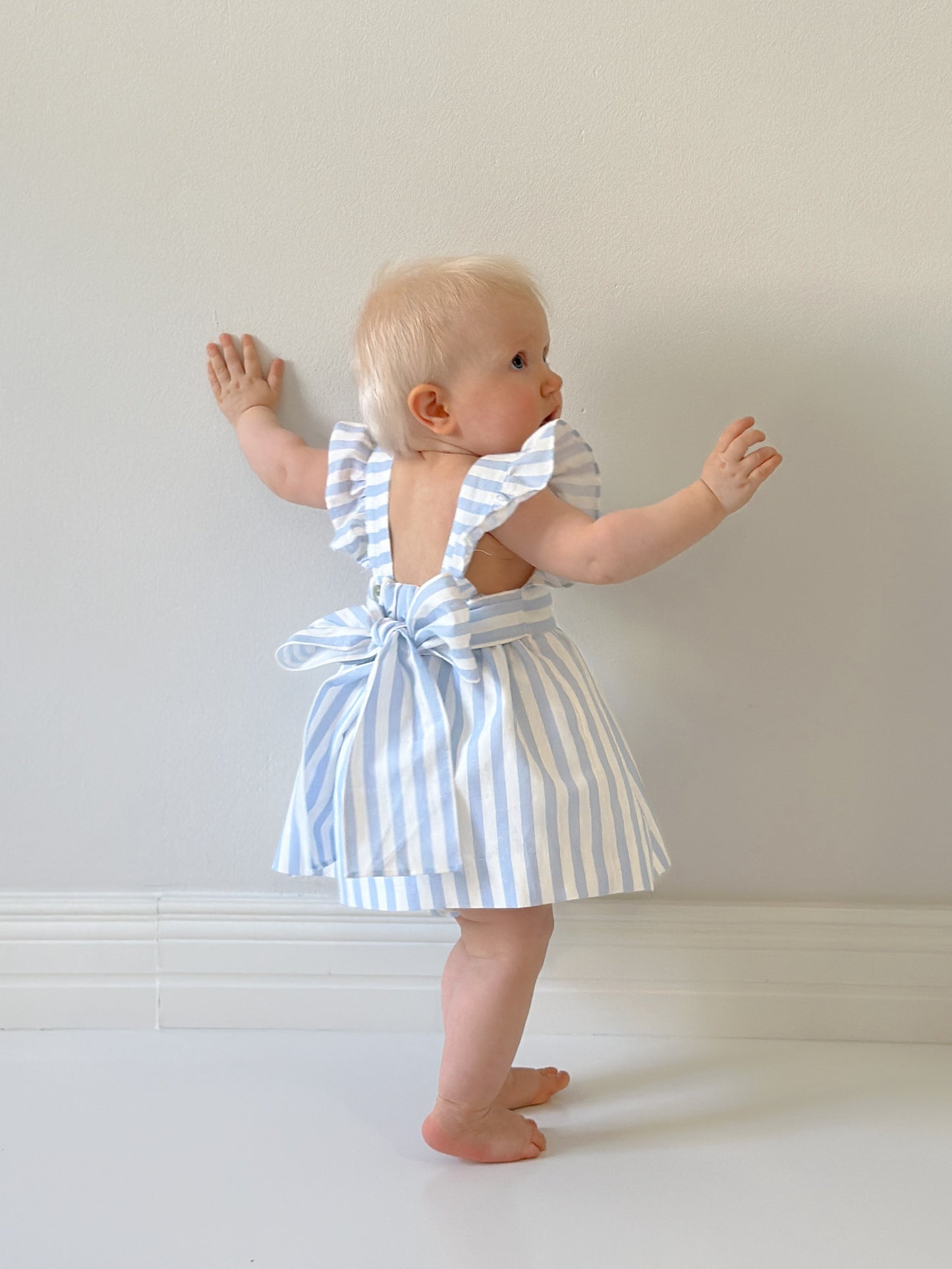 Dulci Bow Dress in striped blue fabric