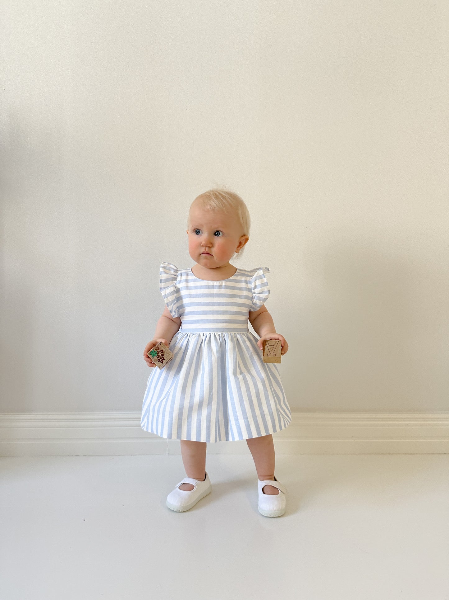 Dulci Bow Dress in striped blue fabric
