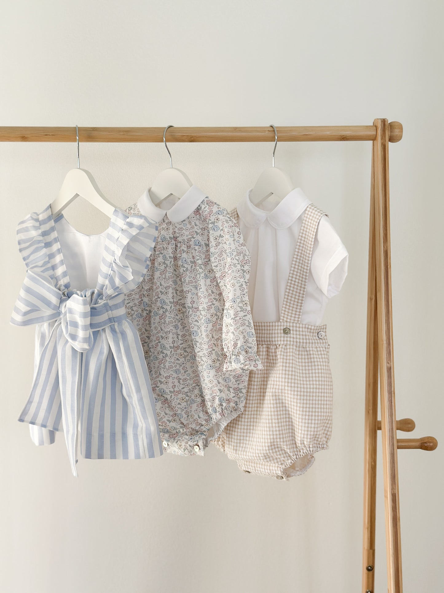 Dulci Bow Dress in striped blue fabric