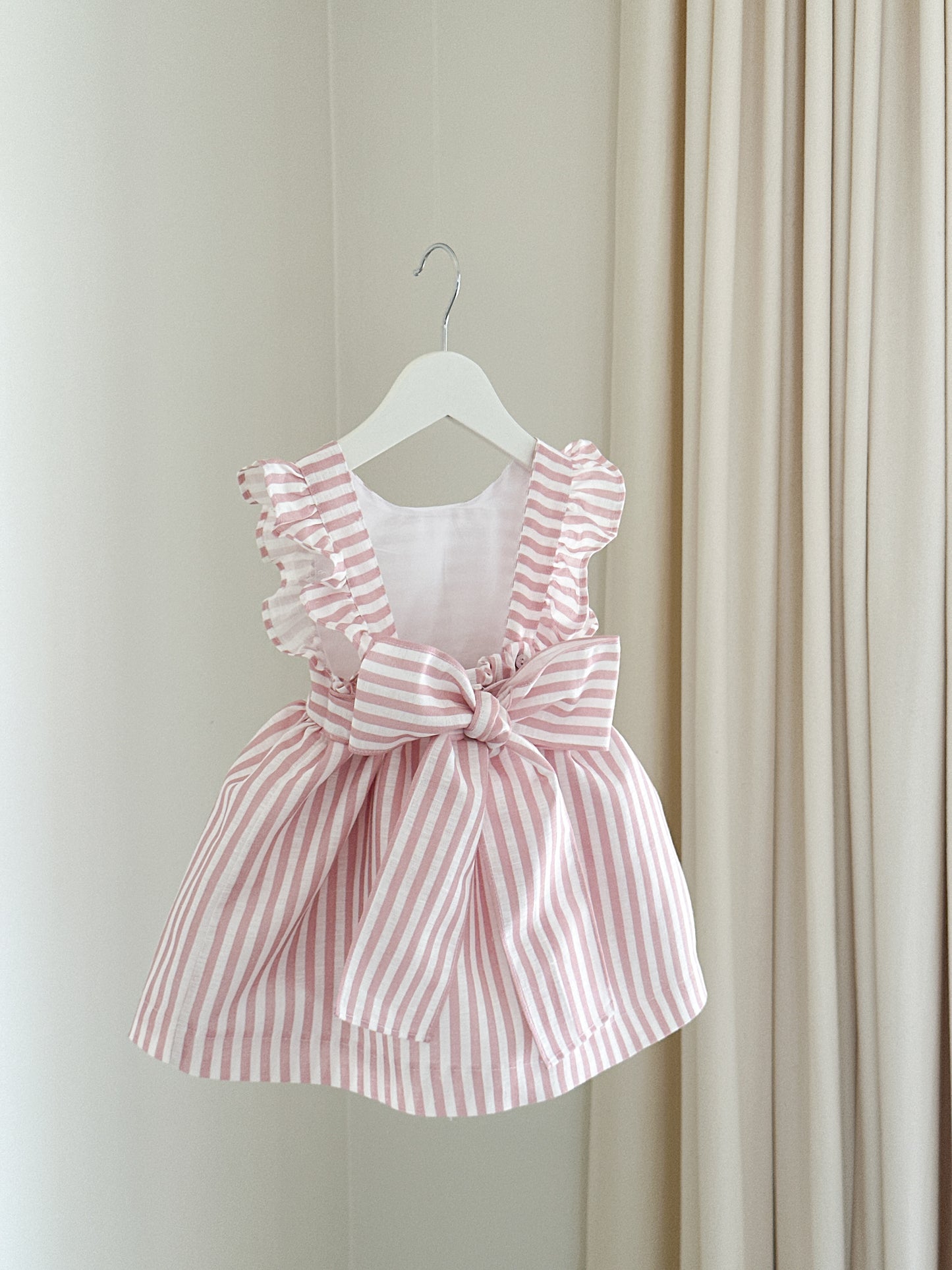 Dulci bow dress in striped blush linen